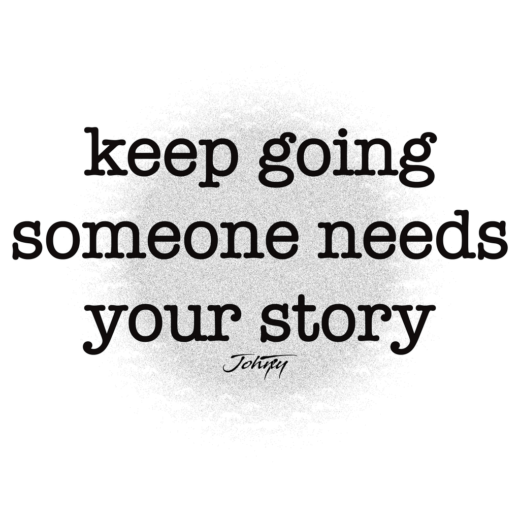 Close-up of a white T-shirt featuring the motivational quote “keep going someone needs your story” in bold black text. A simple and uplifting shirt design symbolizing hope, perseverance, and encouragement.