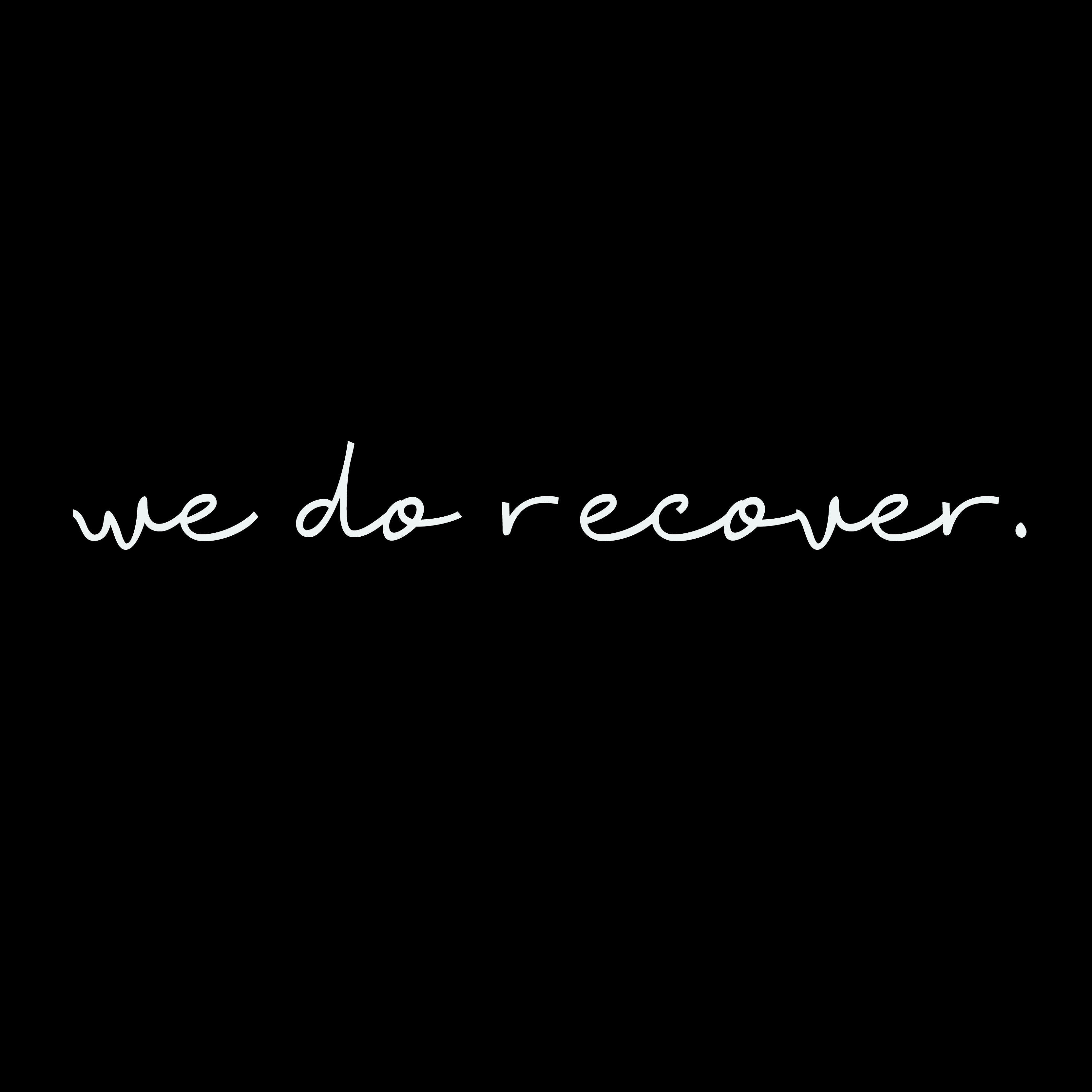 White handwritten text on a black background reading “we do recover.” representing hope, resilience, and strength in the recovery journey