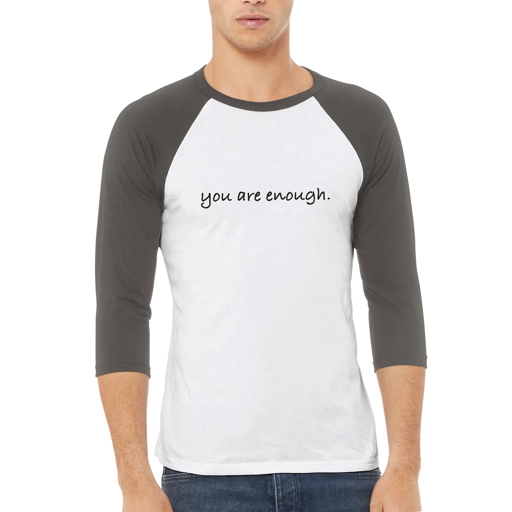 Inspirational raglan T-shirt featuring the phrase "you are enough." in a clean, handwritten font on a white and charcoal baseball-style shirt. A minimalist, uplifting design promoting self-worth, confidence, and positivity — perfect for casual everyday wear or as a thoughtful gift.