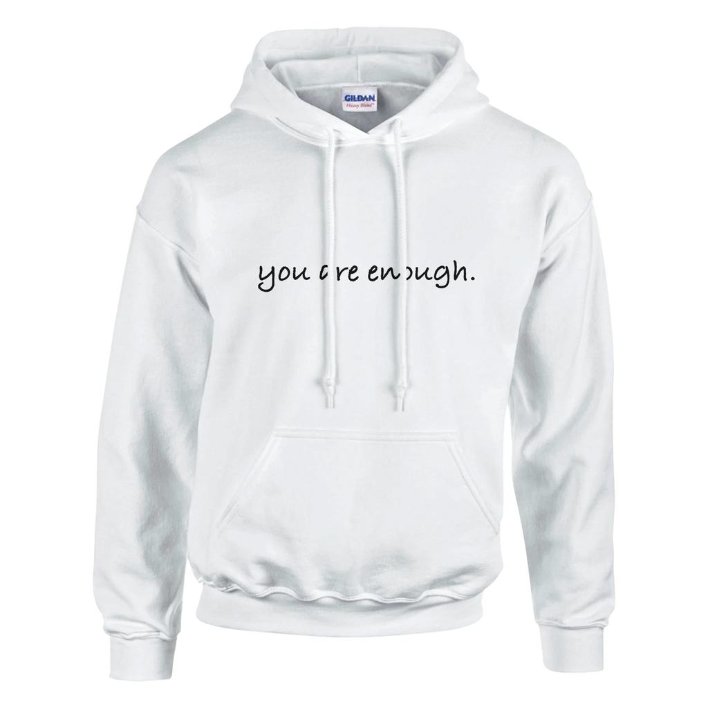 Minimalist white hoodie featuring the motivational quote “you are enough.” in black script font. A cozy and inspiring unisex sweatshirt designed to promote self-love, confidence, and positive mental health.